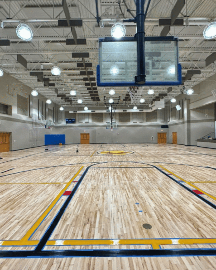 sand and refinish commercial gym flooring basketball court
