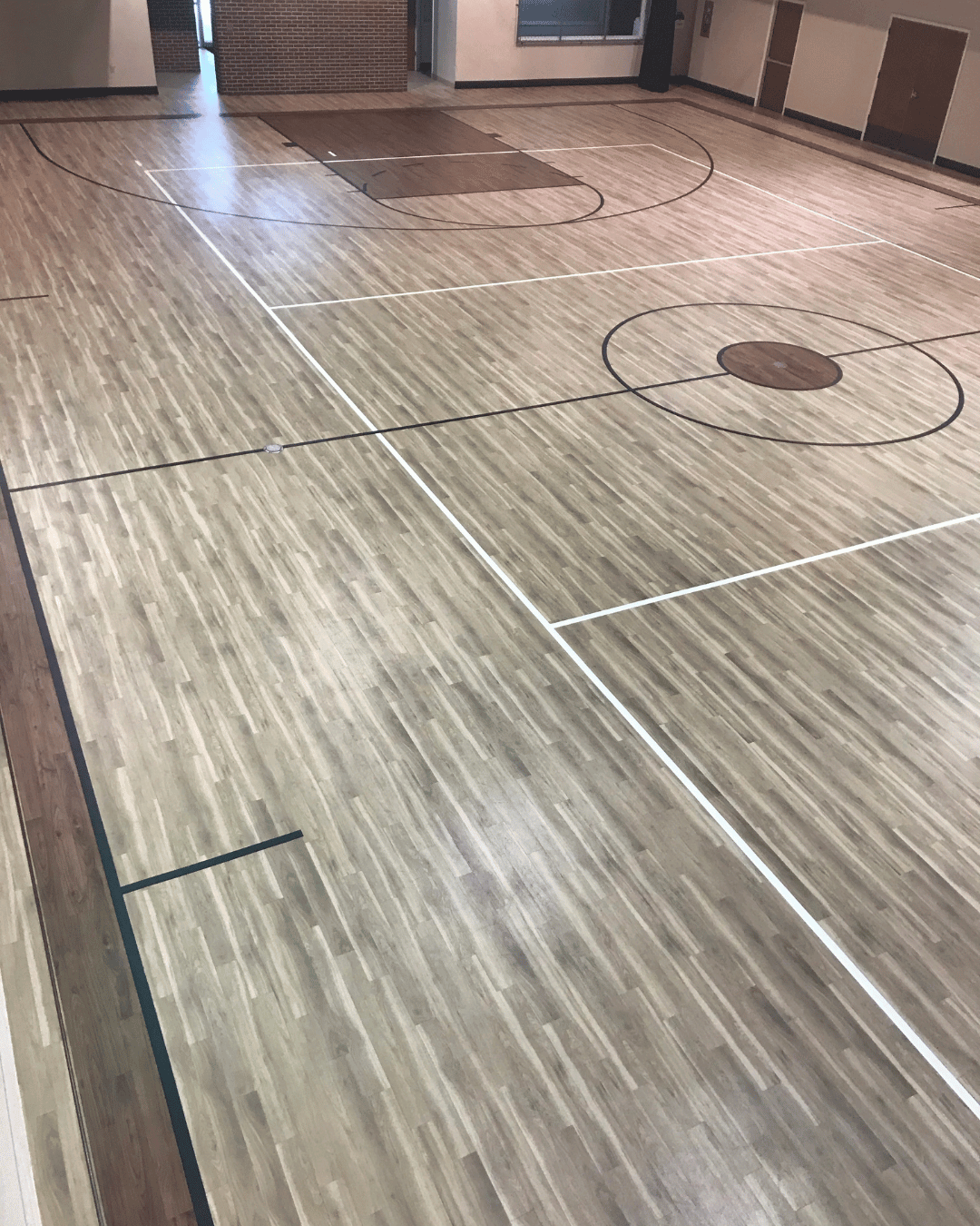 sand and refinish commercial gym flooring basketball court
