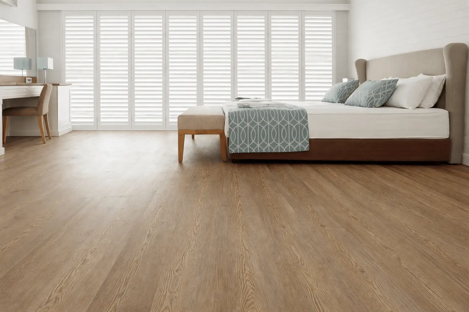Bedroom with plantation shutters and wide-plank engineered oak flooring