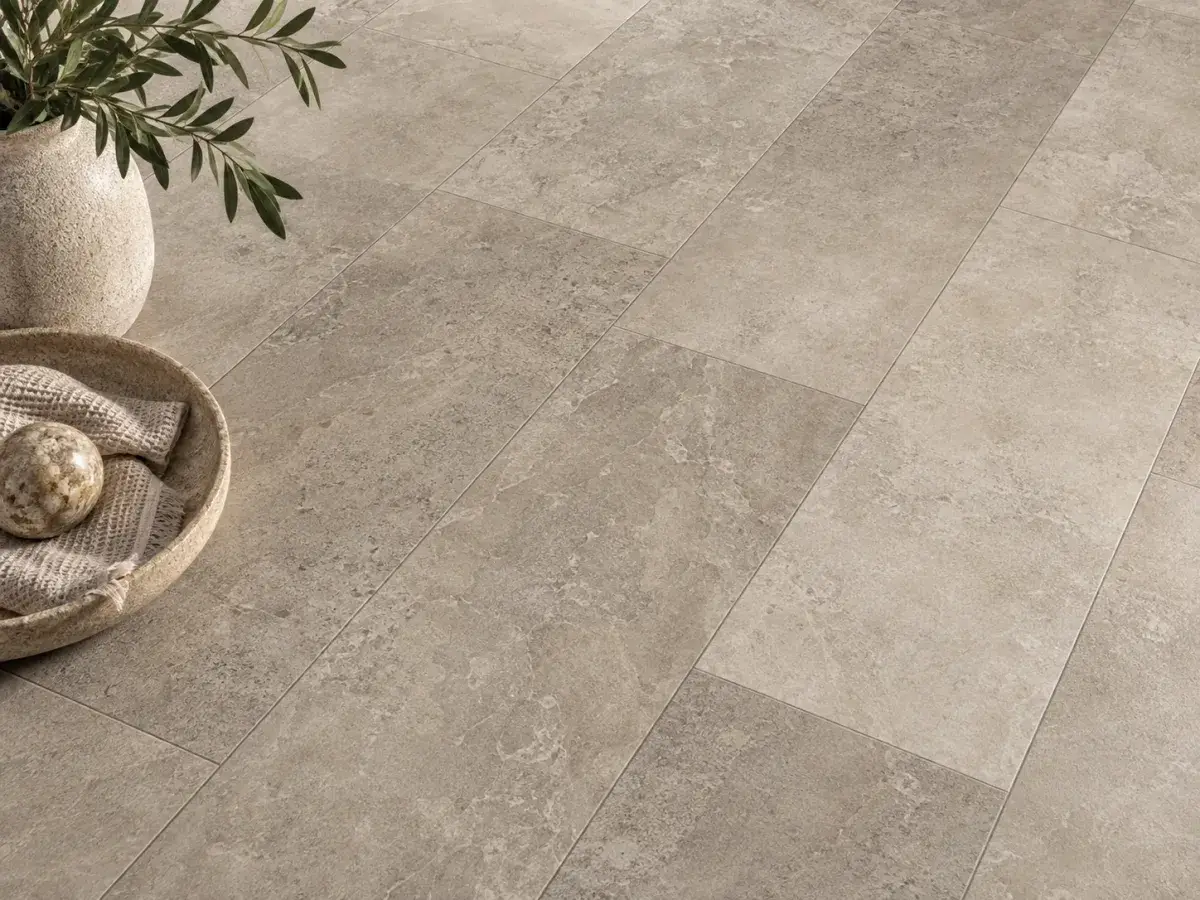 Stone-look greige luxury vinyl tile installation